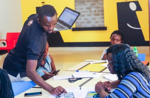 Willy showing a participant how to turn on Two factor Authentication on her Mobile Device